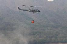 Avanzan operaciones aéreas para contener incendio forestal en Prado, Tolima